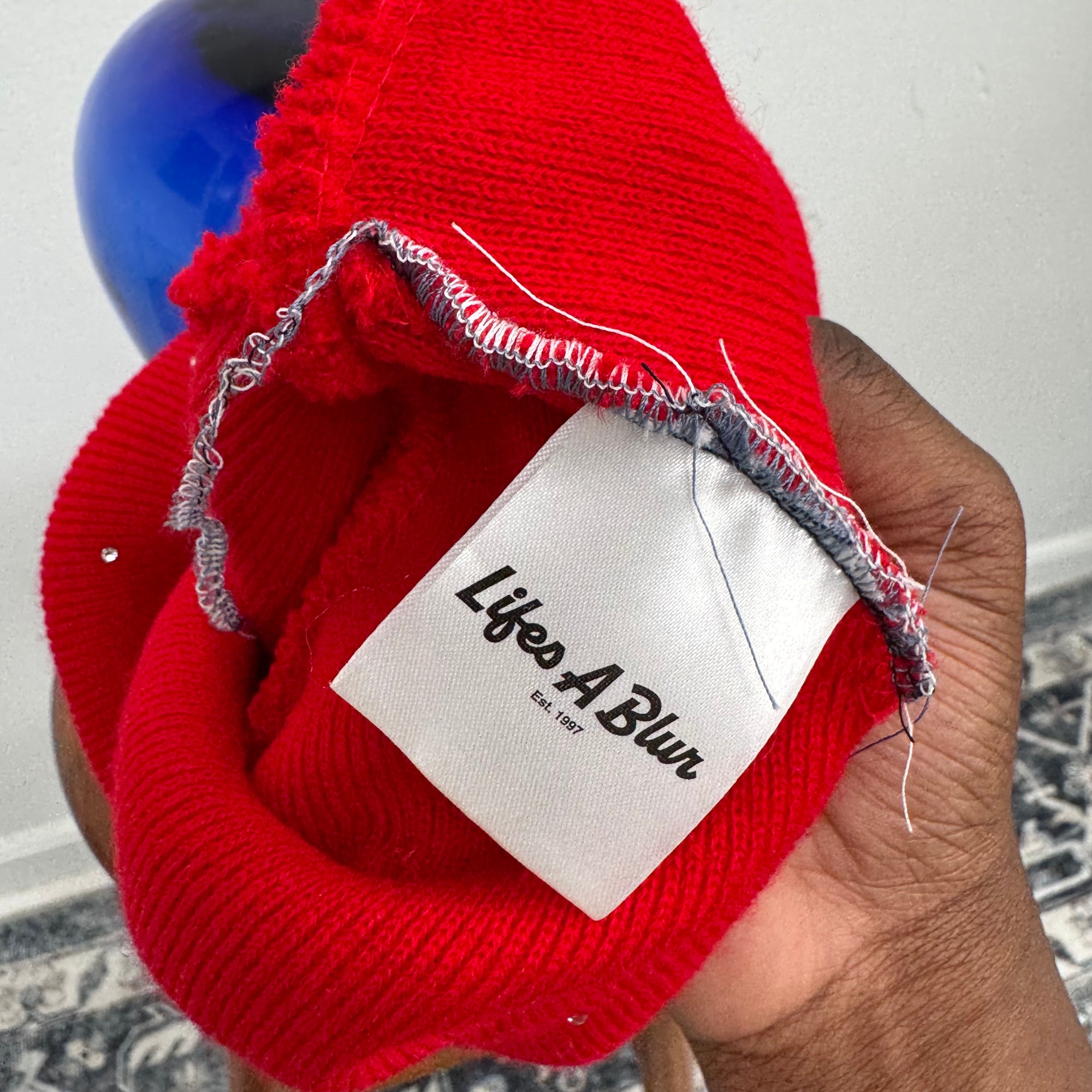 Life's A Blur Red Starburst Beanie